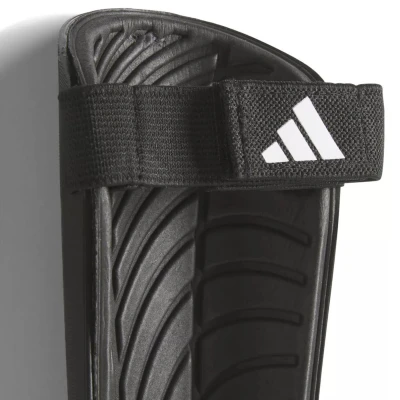 Adidas TIRO SG TRN BLACK/GOLDMT/WHITE fotbalové chrániče