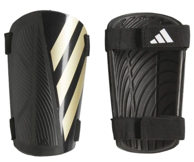Adidas TIRO SG TRN chrániče černo-zlaté Adidas TIRO SG TRN chrániče černo-zlaté