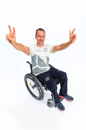 Alpine Pro CAMPION pánské triko z olympijské kolekce zoh 2026 NEUTRÁLNÍ / ZEMITÁ