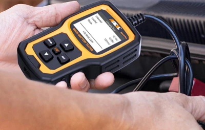 Ancel AD410 PRO černo-oranžový OBD2 diagnostický skener a tester baterie 2v1