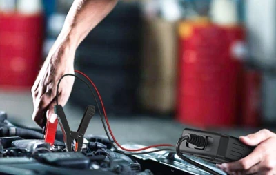 Ancel AD410 PRO černo-oranžový OBD2 diagnostický skener a tester baterie 2v1