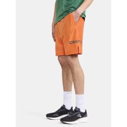 Craft CORE Essence 1910262 pánské šortky - oranžová (579000)