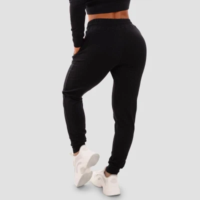 GymBeam Dámské tepláky TRN black POUZE XL (VÝPRODEJ)