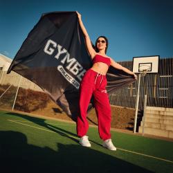GymBeam Dámske tepláky Varsity Red