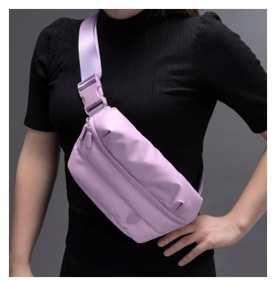 Heys Puffer Mini Waist Bag fialová dámská ledvinka