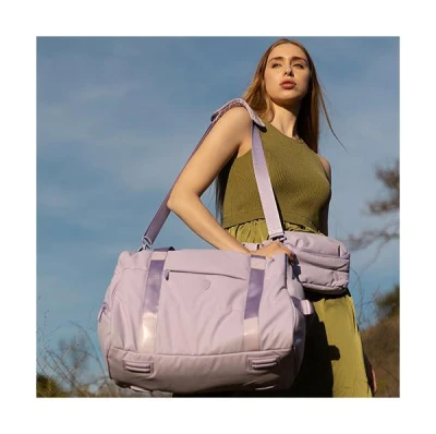 Heys Puffer Waist Bag fialová dámská ledvinka