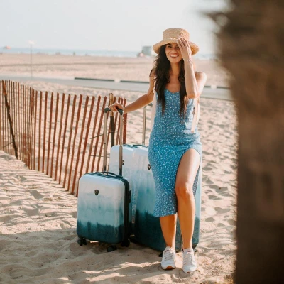 Heys Tie-Dye Blue S kufr + kosmetická taštička zdarma