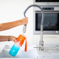 Nils Tritanová fľaša na pitie Camp NCD68 1000 ml oranžovo-modrá