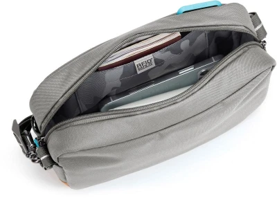 Pacsafe Taška GO CROSSBODY stone