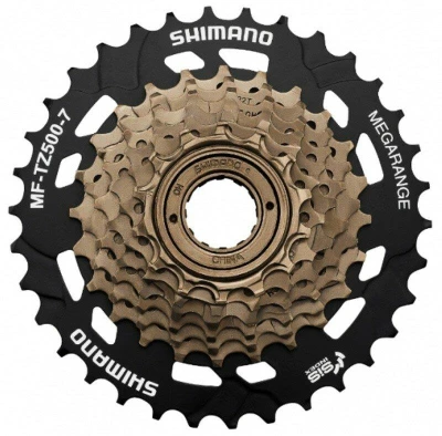 Shimano 7-kolo MF-TZ500 14-34 zubů Megarange, stříbrné/černé, v krabičce Shimano 7-kolo MF-TZ500 14-34 zubů Megarange, stříbrné/černé, v krabičce
