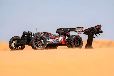 Team Corally Syncro oranžová 2WD 3-4S RTR buggy