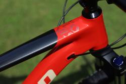 United Clovis 3.10 29 šedo/červené horské kolo + výbava zdarma