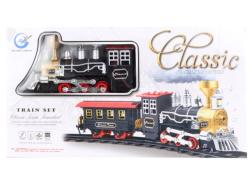 Vláčkodráha s kouřící lokomotivou